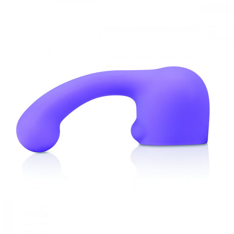Le Wand Petite Curve Massager Attachment. A round hollow cap in purple with a slim, smooth shaft with a slightly bulbous tip, coming out of the top left of the cap. There’s a small bump on the bottom left for clitoral stimulation.