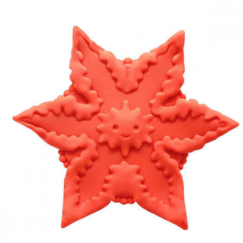 Starsi vibrator in orange. A concave, hand-sized vibrator in the shape of a starfish, with starfish face on inside curve.