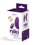 VeDO Niki Remote controlled Panty Vibrator in dark purple. A small curved vibe with a smaller removable magnet on the outer side. Single button control on outer side. Remote control with a power / pattern button, plus button, and minus button.