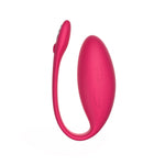 We-Vibe Jive insertable vibrator in pink. A small, oval shaped vibe with a slim cord for removal.