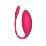 We-Vibe Jive insertable vibrator in pink. A small, oval shaped vibe with a slim cord for removal.