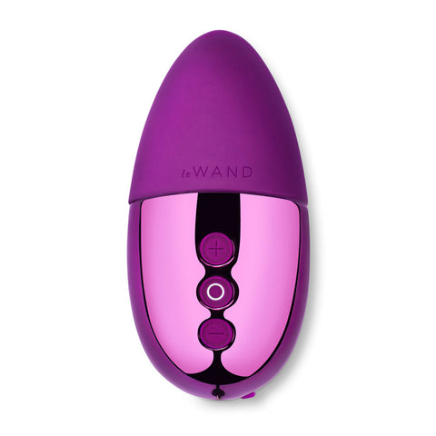 Le Wand Point palm vibe in Dark Cherry. A domed, palm-sized vibe. The top half is silicone and has a lightly ribbed texture on the bottom side. The bottom half is dark cherry chrome and has 3 button controls.