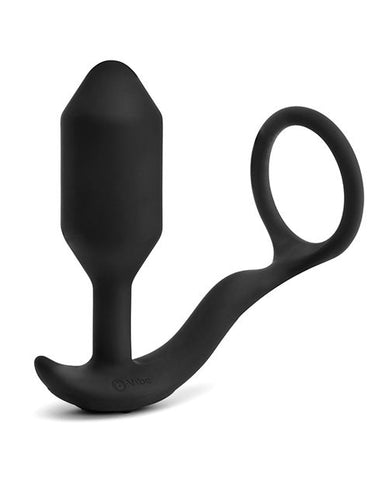 B-Vibe Vibrating Snug & Tug (Medium). A thin cock ring and medium cylindrical butt plug with a slightly pointed tip and narrow neck, connected by a thick silikcone cord. In black.