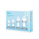 B-Vibe Glass Anal Dilator Set. Four glass dilators with a tapered tip and round flared base, each increasing in length and girth.