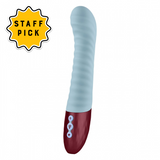 Femme Fun Lola G Vibrator in light blue. A 6.25 inch, girthy, ribbed shaft with maroon base and three button controls.