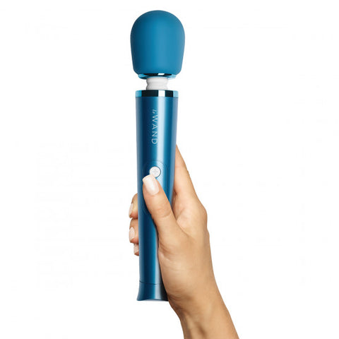 Le Wand Petite massager in Blue. A long, wide handle, slim flexible neck and rounded head. Three button controls in the middle of the handle. 