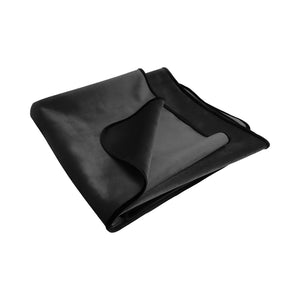 A black velvety blanket folded into a square