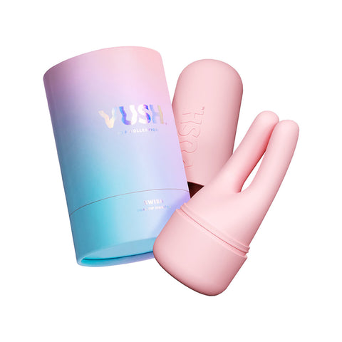 Vush Swish Dual Tip Vibrator in pink. A small vibrator with two tips like rabbit ears, with one button control.