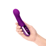 Le Wand Gee G-spot vibrator in Rose Gold. A shortish, slim, curved shaft with shiny base and button controls on front.