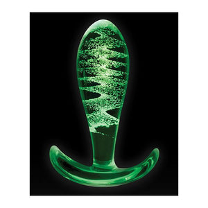 FireFly Glass Ace Anal Plug. A medium glass butt plug with a glow in the dark swirl inside and curved flared base